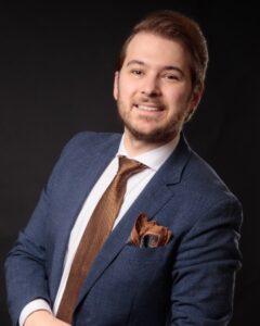 cropHDWHWLCJ-Presenter-TavelliL